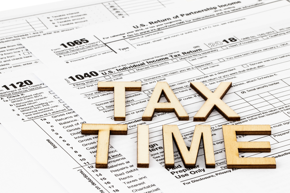The tax forms 1040,1120,1065. Tax Day concept.